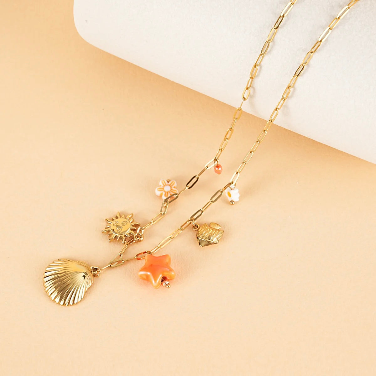 Eclat Paris Gold Chain Necklace With Orange Sea Charms