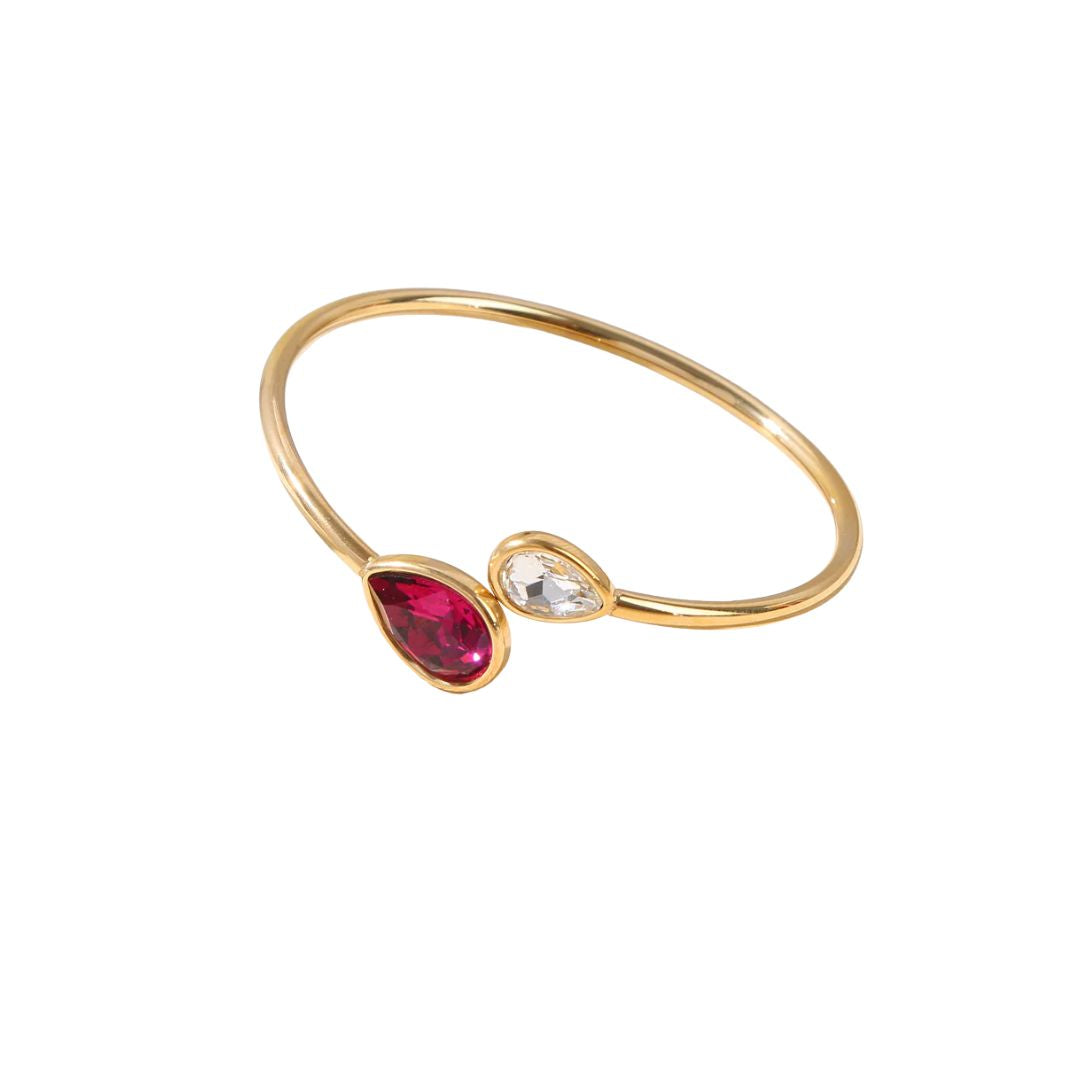 Eclat Paris gold cuff bracelet, with white and fuchsia teardrop glass crystals