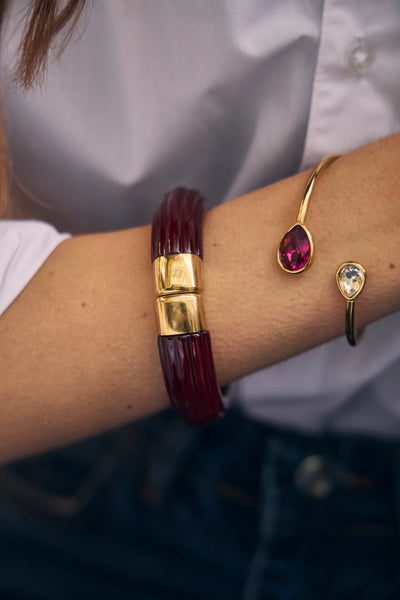 Eclat Paris gold cuff bracelet, with white and fuchsia teardrop glass crystals